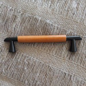 BRAND NEW - set of  ten black metal and manufactured wood drawer pulls!